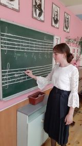 Клычкова Анастасия за выполнением письменных экзаменационных заданий